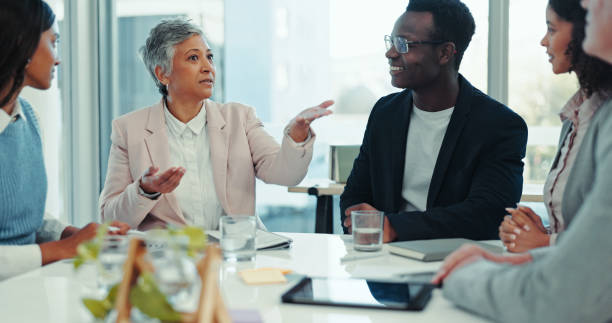istock Teamwork, workshop and planning with business people in meeting for feedback, brainstorming and public relations. Workflow, project management and media campaign with employees in office for solution 2200785787