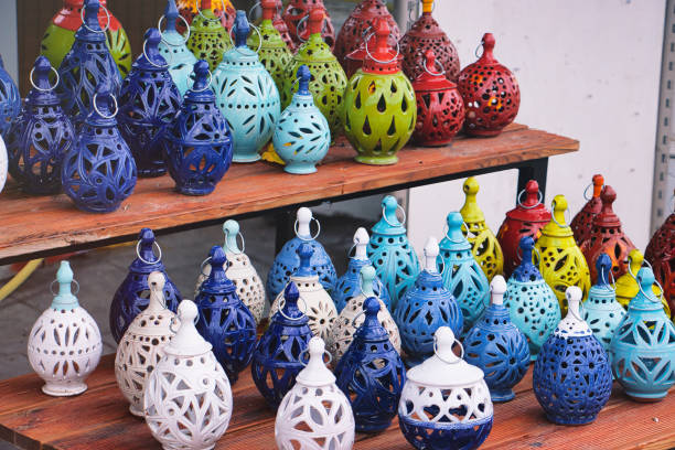 istock Ceramic jugs and lanterns on the souvenir market, . handmade and creative, different colors 2200789232