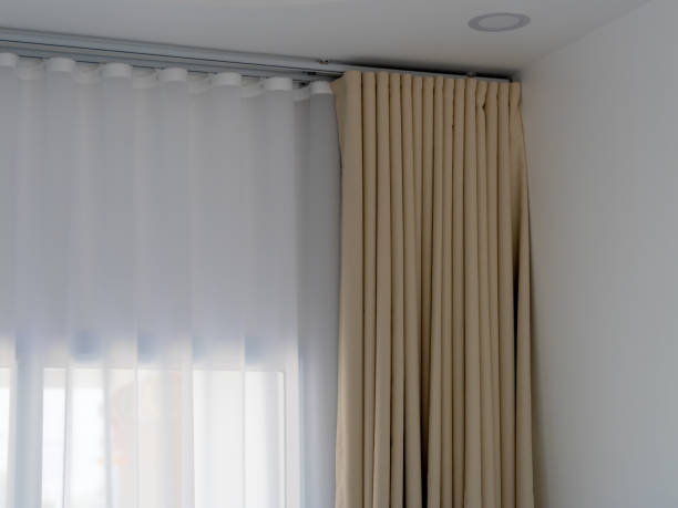 istock Sheer and solid curtains enhance modern room design with soft lighting and cozy feel 2200790706
