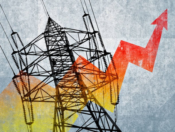 Electricity pylon - power lines with a red arrow pointing upwards, symbolizing rising electricity prices or increased energy demand stock photo