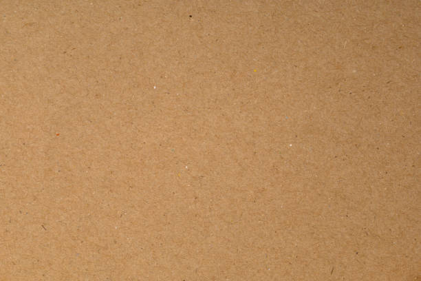 istock Cardboard sheet texture background, pattern of brown craft paper with vintage style. 2200808273
