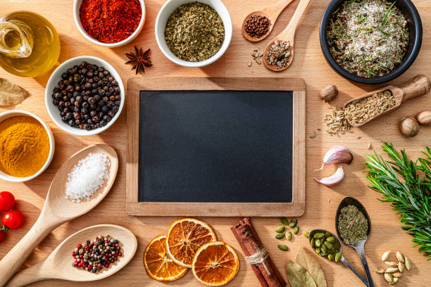 istock Cooking or seasoning background. Spices and herbs frame with copy space 2200808833