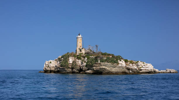 istock Peristeres Lighthouse on a Kaparelli rock, Corfu Greece 2200825581