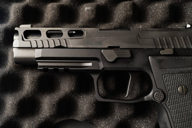 istock Modern tactical pistol with a lightweight slide. 2200829899
