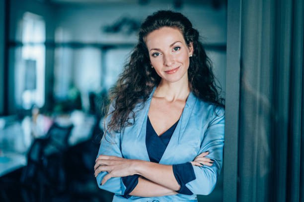 istock Smiling businesswoman at work 2200830598