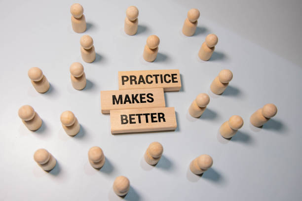 istock Wooden blocks with words 'Practice Makes Perfect'. Business concept. 2200830883