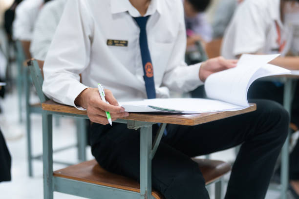 istock University Students Taking an Exam in a Classroom. 2200831447