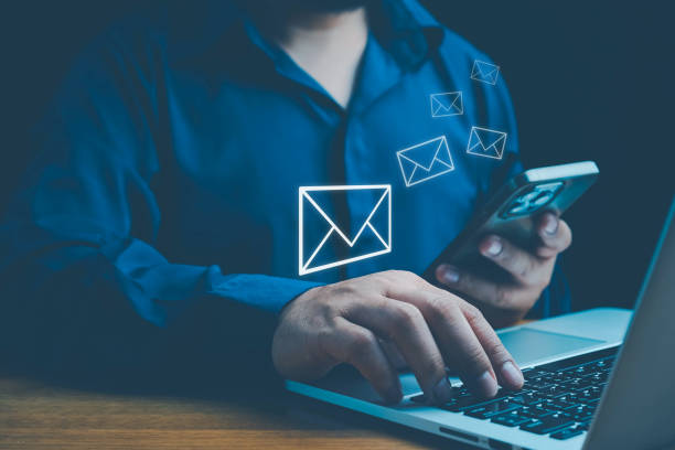 istock Email marketing concept, Human touch on email and surfing the internet with email icon, email icon, e-mail communication, e-mail marketing concept, send e-mail or news letter, online working internet. 2200837637