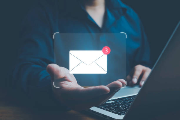 istock Email marketing concept, Human touch on email and surfing the internet with email icon, email icon, e-mail communication, e-mail marketing concept, send e-mail or news letter, online working internet. 2200837713