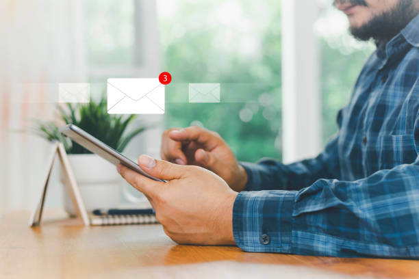 istock Email marketing concept, Human touch on email and surfing the internet with email icon, email icon, e-mail communication, e-mail marketing concept, send e-mail or news letter, online working internet. 2200837766