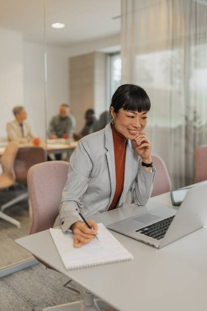 istock Businesswoman working on laptop with determination 2200838645