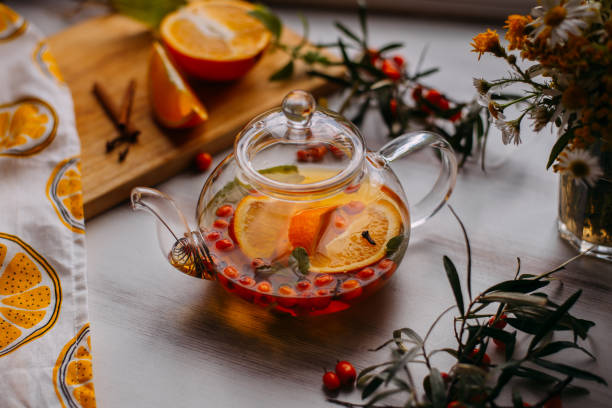 istock autumn tea with oranges and berries herbal 2200842849