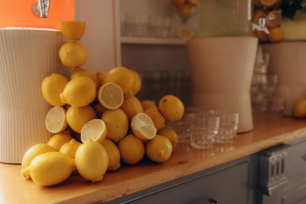 Lots of yellow lemons on the lemonade table
