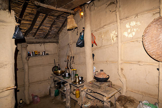istock Kitchen inside a mud hut in a village in south Nepal, Asia 2200843996