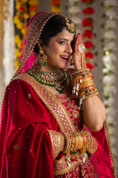 istock Shy bride with hiding her face with hand 2200848762