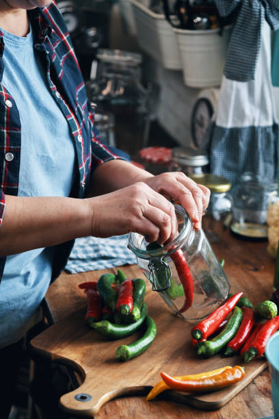 istock Fermented Foods - Preparing Fermented Mixed Chili Peppers 2200849483