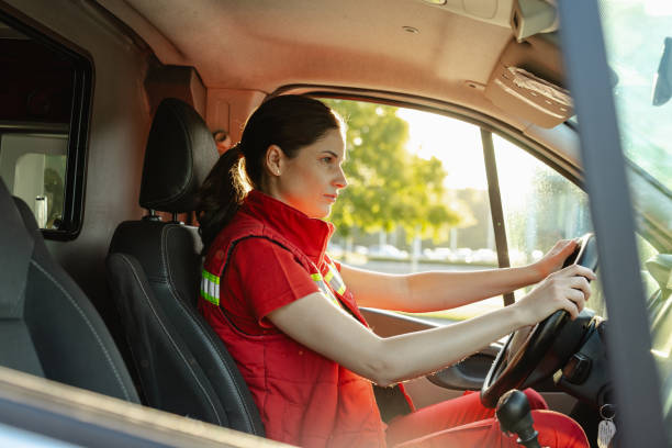 istock Emergency response worker driving a vehicle during a bright sunny day 2200849558