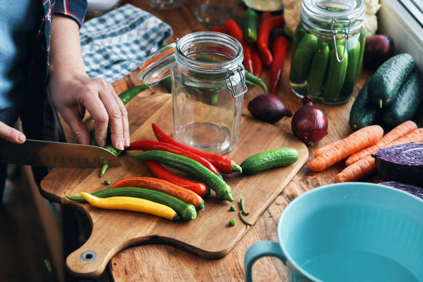 istock Fermented Foods - Preparing Fermented Mixed Chili Peppers 2200849584
