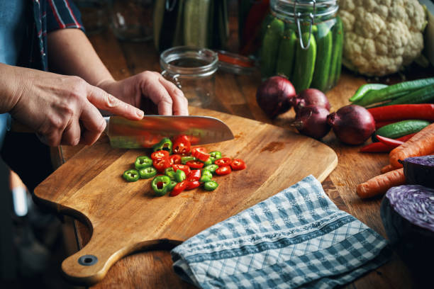 istock Fermented Foods - Preparing Fermented Mixed Chili Peppers 2200849604