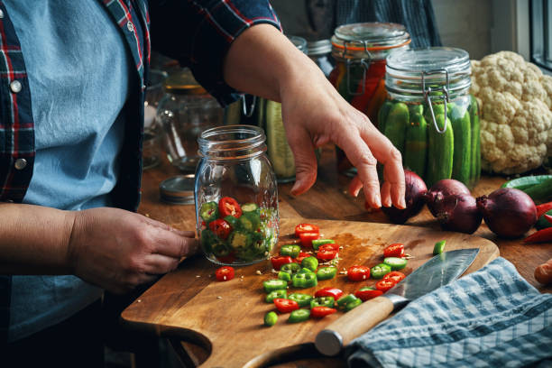 istock Fermented Foods - Preparing Fermented Mixed Chili Peppers 2200849677