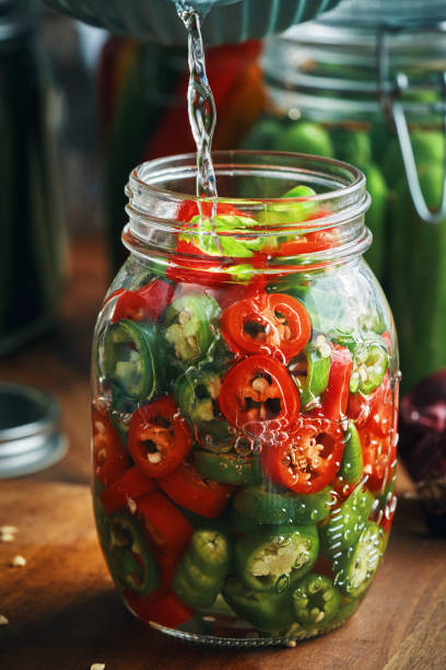 istock Fermented Foods - Preparing Fermented Mixed Chili Peppers 2200849693