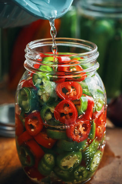 istock Fermented Foods - Preparing Fermented Mixed Chili Peppers 2200849737