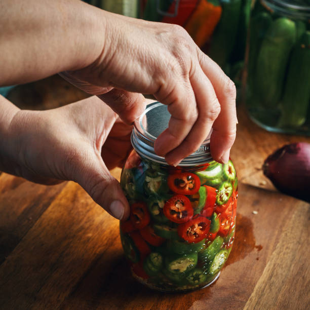 istock Fermented Foods - Preparing Fermented Mixed Chili Peppers 2200849740