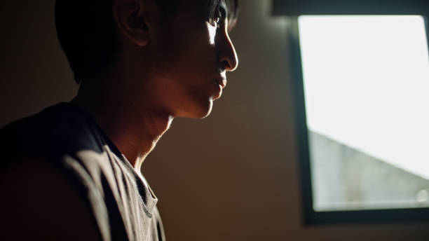 istock In silhouette of man contemplation. 2200850909
