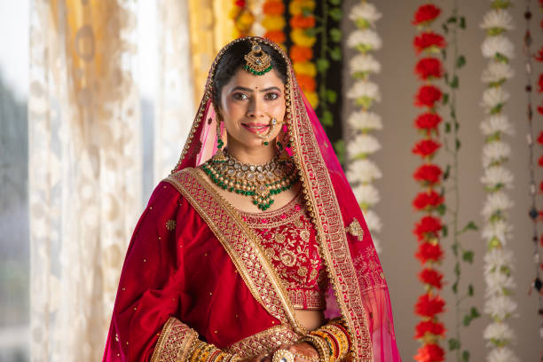 istock Beautiful bride in red traditional clothing at wedding ceremony 2200850949