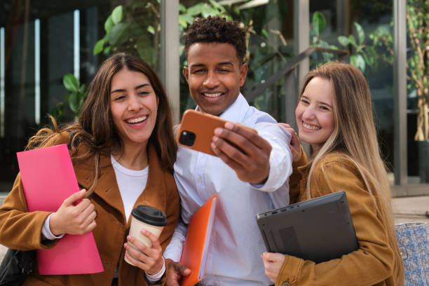istock Young Adults Taking a Fun Selfie Together 2200853272