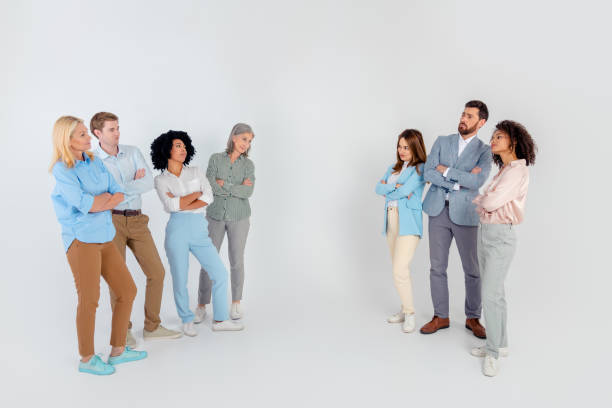 istock Diverse group of professional colleagues in a business setting showcasing teamwork on a light grey background 2200853331