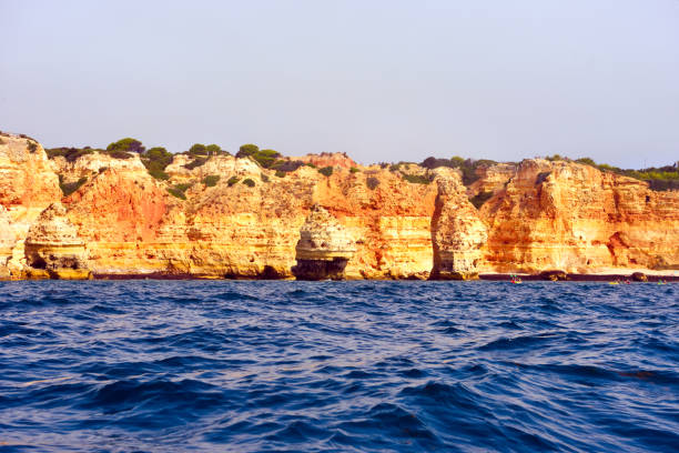 canoeists inside a cave, the Algarve rock formation is a unique and amazing natural wonder 17 Sep 2024 lagoa Portugal