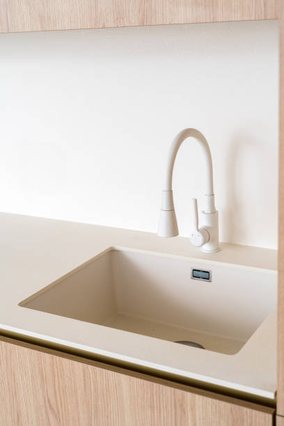 istock Modern kitchen sink with minimalist design and clean lines in a residential setting 2200856515