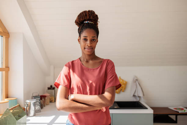 istock Confident Black Woman in Modern Kitchen 2200859223