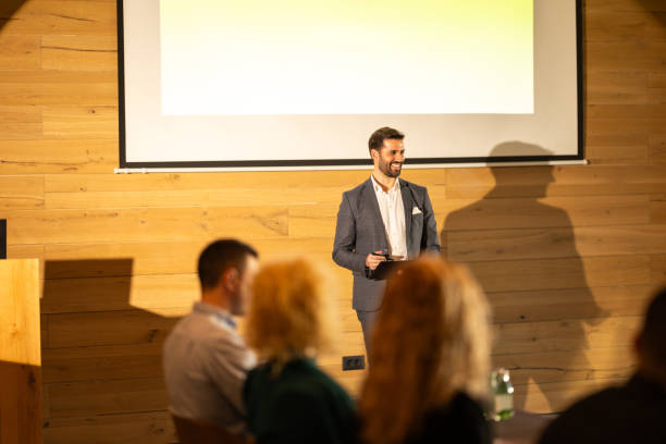 istock Businessman speaking to the audience 2200864021