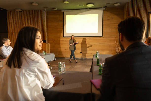 istock Businesswoman speaking to the audience 2200864581
