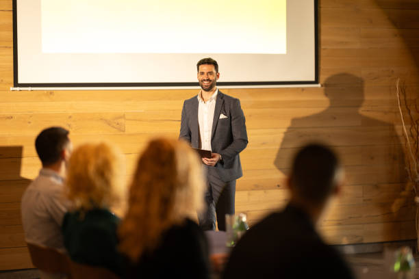 istock Businessman speaking to the audience 2200864970