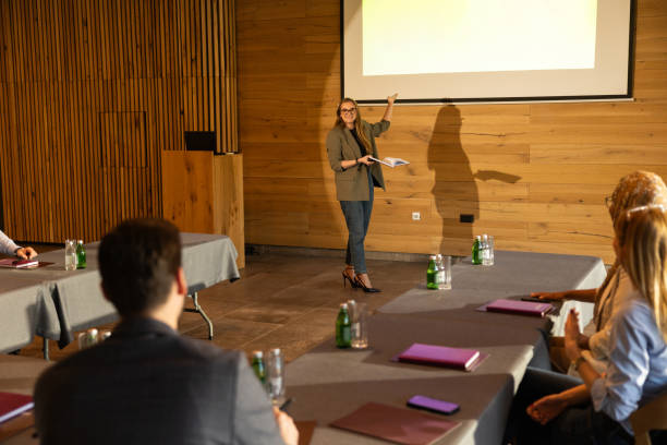 istock Businesswoman speaking to the audience 2200865217