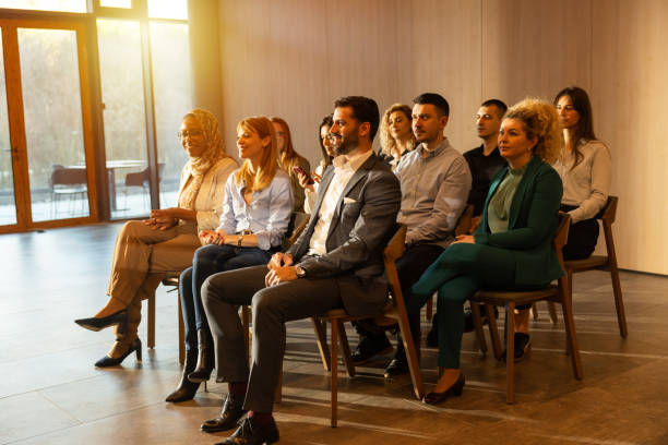 istock Diverse businesspeople attending seminar in luxury hotel 2200865554