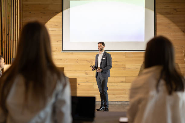 istock Businessman speaking to the audience 2200865709