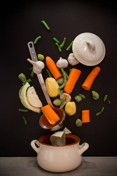 istock Vegetables in motion before cooking in soup 2200866048
