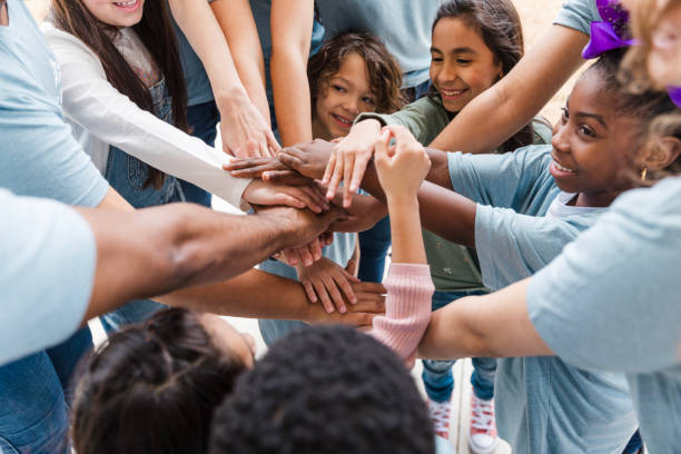 istock Multiracial Group of People Stacking Hands, Teamwork Concept 2200866878