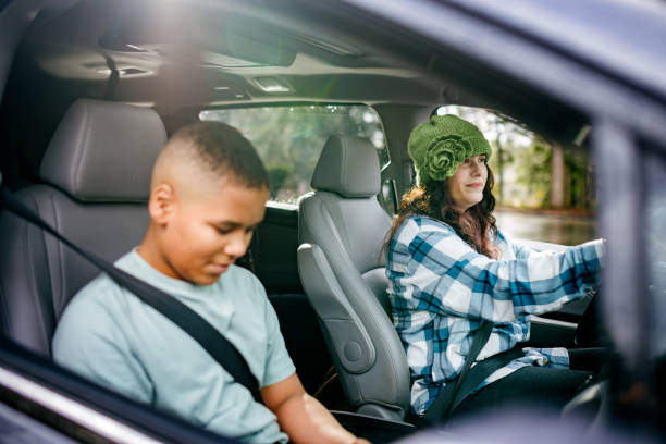istock Happy Family Riding In Minivan Together 2200868268