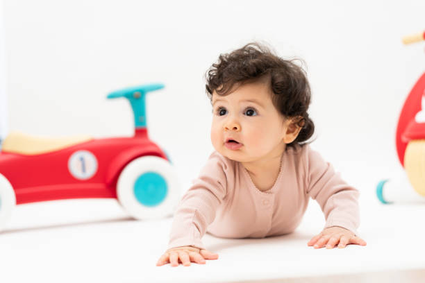 istock Cute Portrait of a Crawling Baby 2200870455