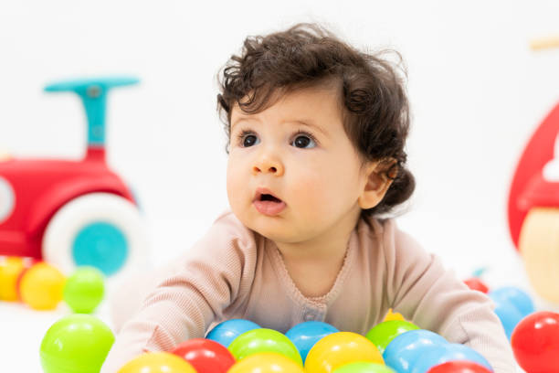 istock Cute Portrait of a Crawling Baby 2200870464