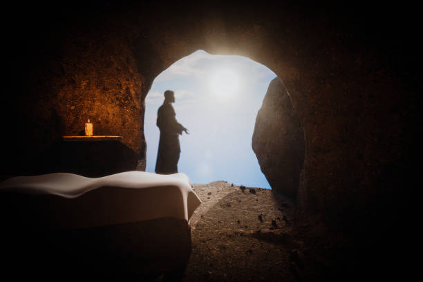 istock Jesus Christ Resurrection from Stone Tomb Bokeh Silhouette. 3d Rendering 2200871065