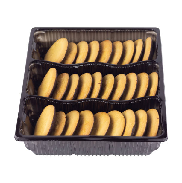 istock container with round cookies with chocolate, isolated from background 2200871259