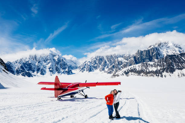 istock Mother and daughter take a selfie during glacier landing experience 2200872243