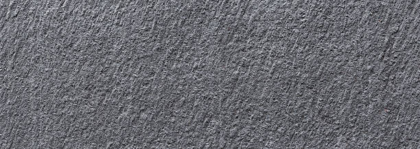 Rough surface gray concrete wall background texture, close up Rough surface gray concrete wall background texture, close up Decorative Concrete walls stock pictures, royalty-free photos & images