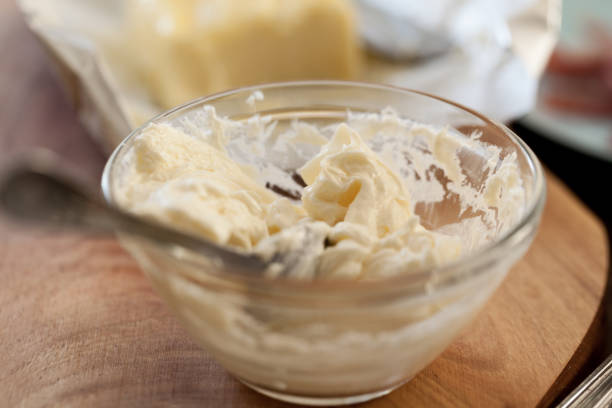 istock Butter board preparing, butter and soft cheese, close up 2200880973